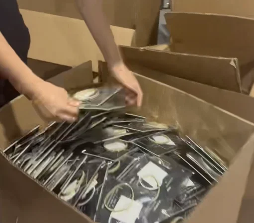 Quantity verification and carton packing process at a China prep center